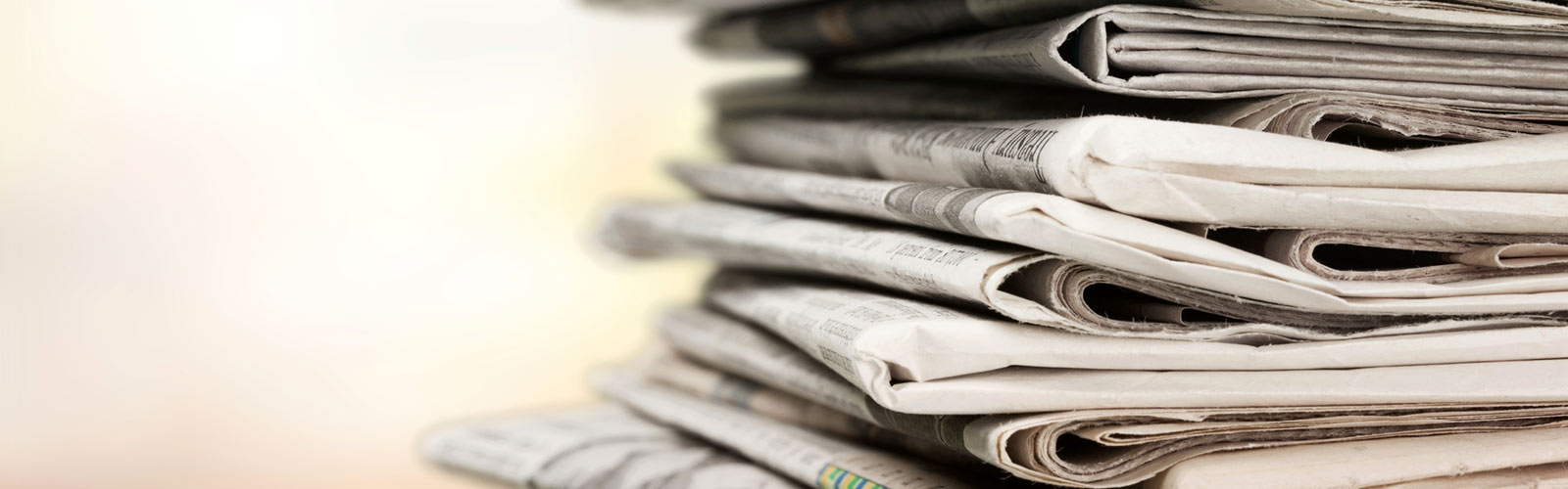 Stack of newspapers.