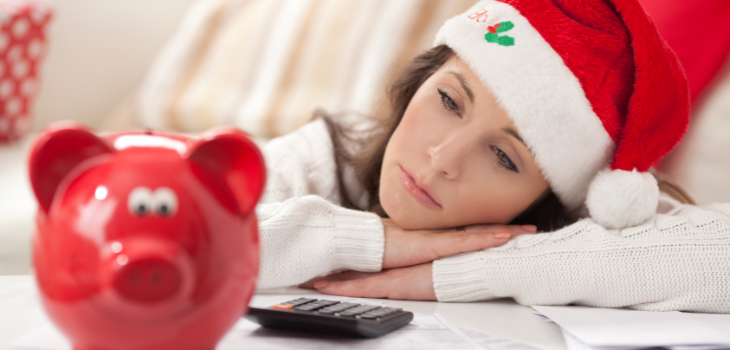 A woman contemplating her spending during the holiday season