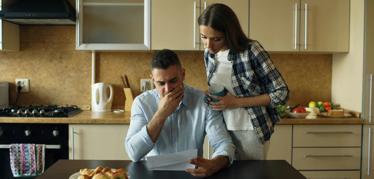 A couple goes over their finances, confused as to where there money is going every month and why they live paycheck to paycheck. It is time for a financial wellness check.